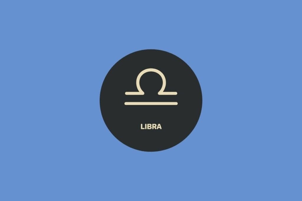 Ilustração do signo de Libra em um círculo sobre um fundo azul