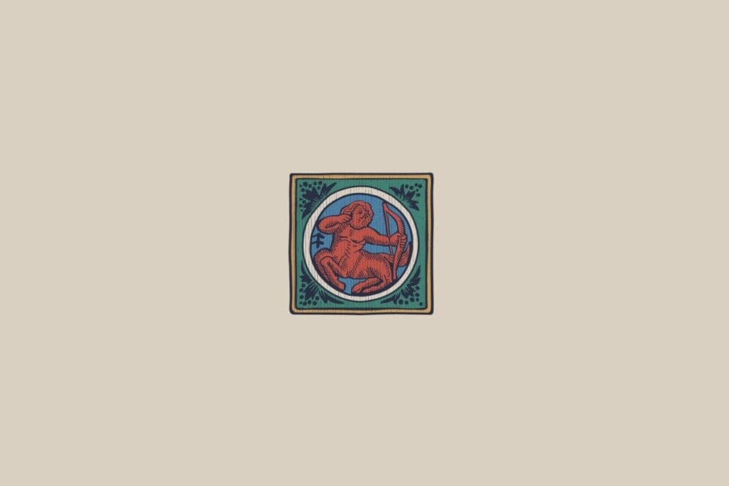 Ilustração do signo de Sagitário em um estilo medieval, retratando um arqueiro centauro vermelho sobre um fundo azul