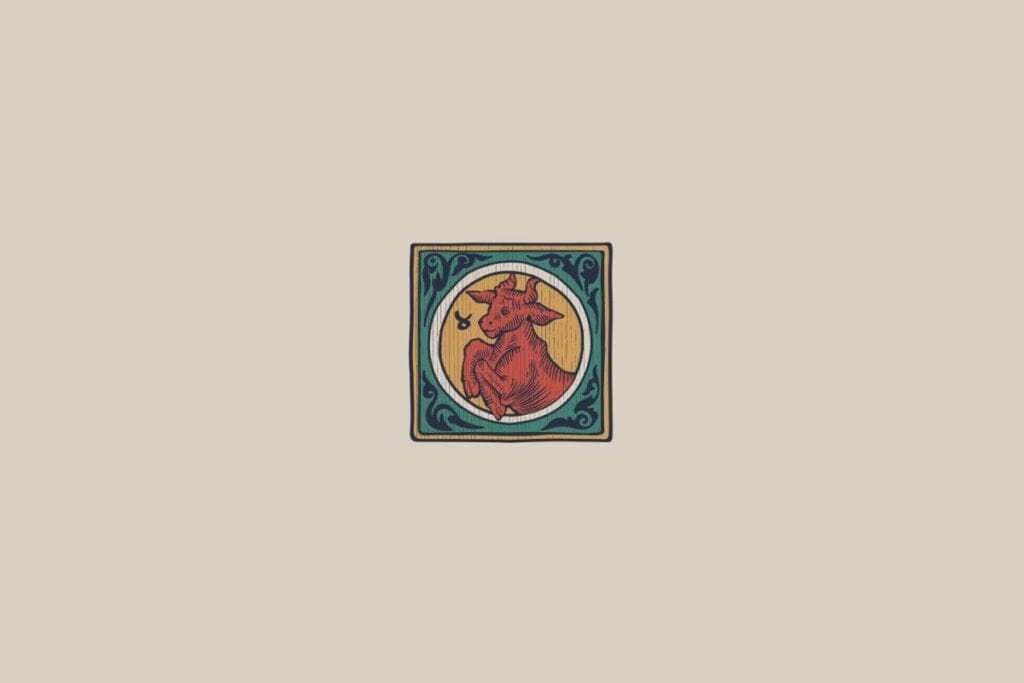 Ilustração medieval estilizada do signo de Touro, mostrando um touro, emoldurado por elementos decorativos