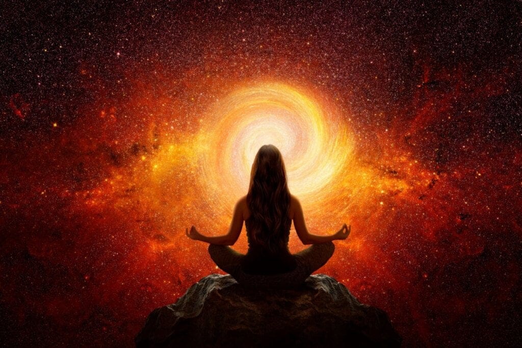 Mulher em pose de ioga de frente para o universo